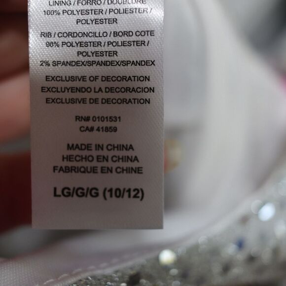 JoJo Siwa Silver Sequin Jumpsuit with Pink and Blue Accents - Picture 14 of 15